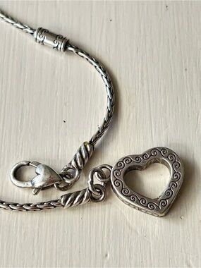 Brghton single strand bracelet w filigree open heart.